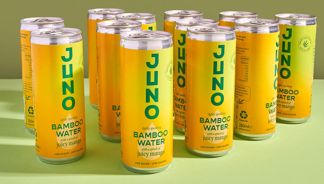 Juno-Bamboo-Water-cans-standing-on-green