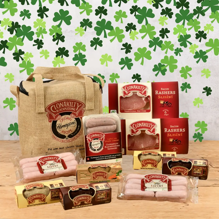 Clonakilty St Patricks Day Hamper with green clovers in background