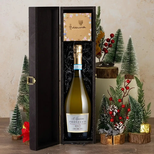 Prosecco and truffles in wooden box