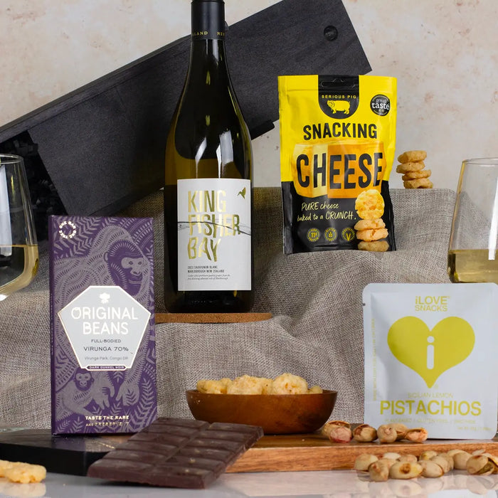 White wine, chocolate, snacking cheese and pistachios.