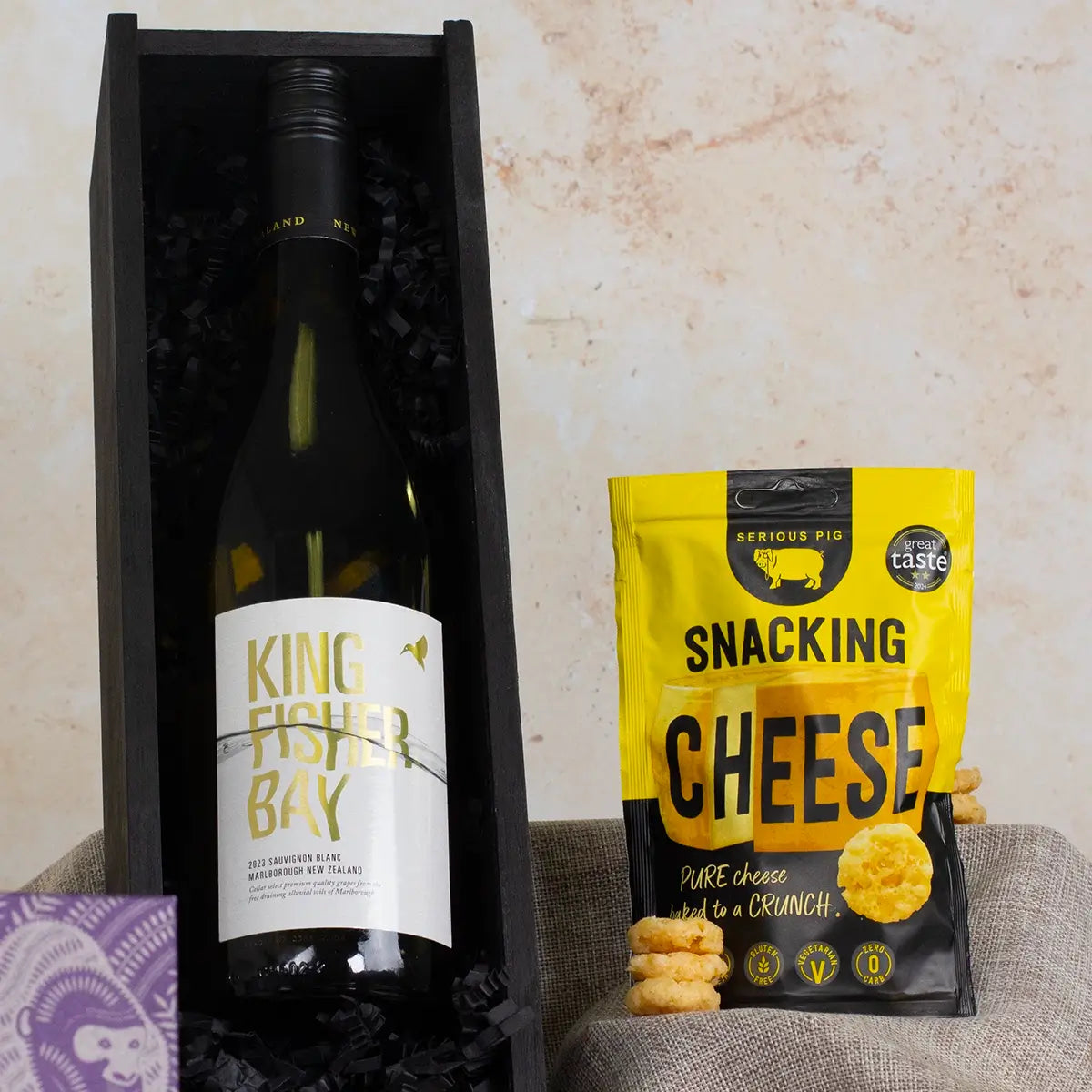 White wine and snacking cheese close up