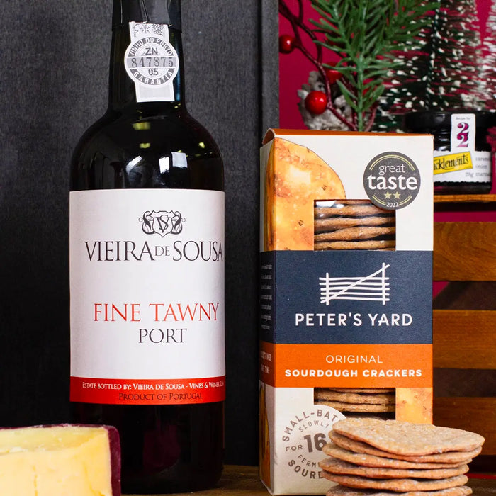 Port and crackers close up