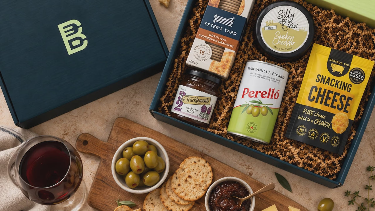 Load video: Video showing cheese and savoury snacks hamper with close up of products in gift box