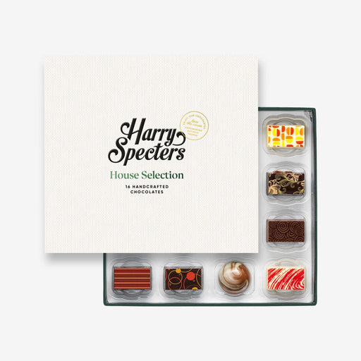 A chocolate selection box containing 16 chocolates, partially covered by a lid showing the name Harry Specters. The chocolates seen within this gift box are a colourful mix of white, milk, and dark chocolate with two Valentine's Day message chocolates.