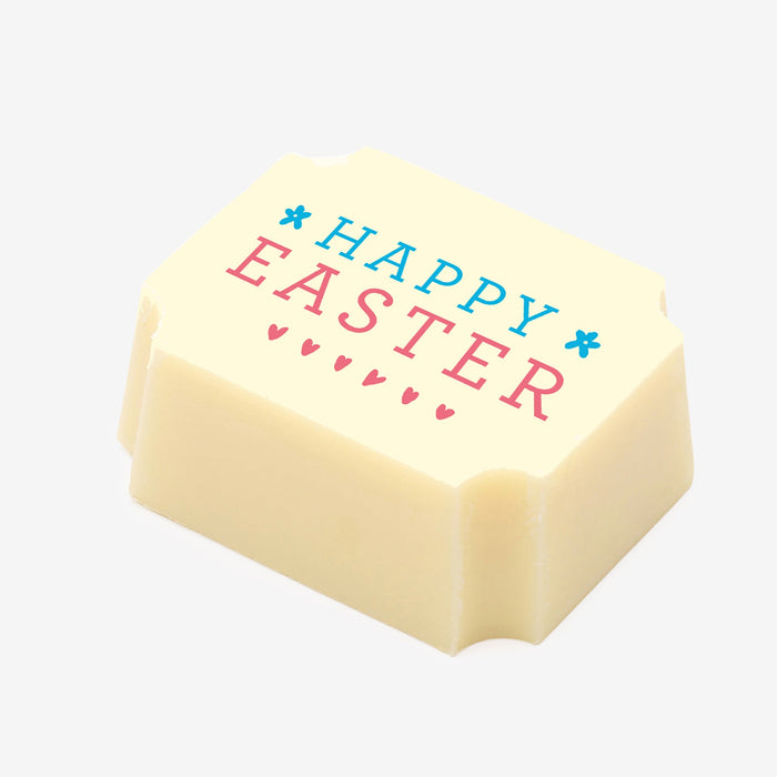 A white chocolate filled with dark chocolate ganache, made by Harry Specters, with a Happy Easter message printed on the top.