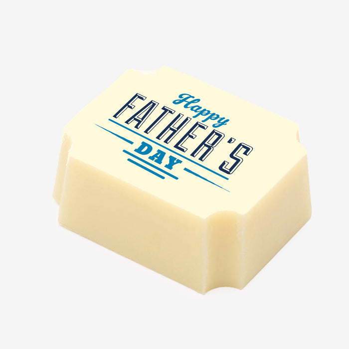 A white chocolate filled with dark chocolate ganache, made by Harry Specters, with a Father’s Day message printed on the top.