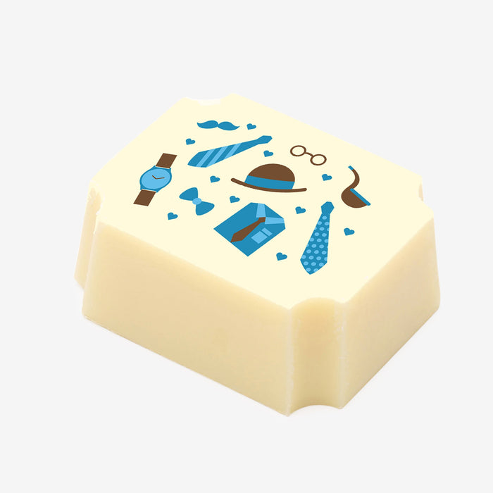  A white chocolate filled with dark chocolate ganache, made by Harry Specters, with a Happy Father’s Day themed image printed on the top.