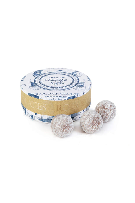Rococo Chocolates Mini Marc de Champagne Truffle Tub. Milk Chocolate Champagne Truffles, dusted with icing sugar and gift wrapped. Perfect Teacher Gift. Buy Online now.