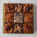 9 square caramel and date cakes topped with caramel, dates, walnuts, Belgian chocolate and fudge pieces