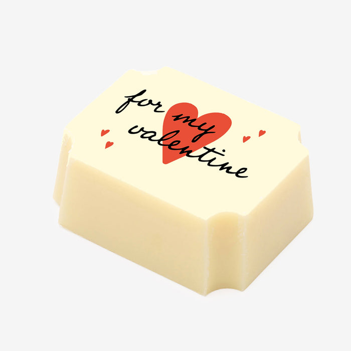 A white chocolate filled with dark chocolate ganache, made by Harry Specters, with a Valentine’s Day message printed on the top.